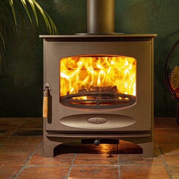 Charnwood C-Seven (BLU) Low in Brown - Lifestyle Image with a Natural Green Backdrop