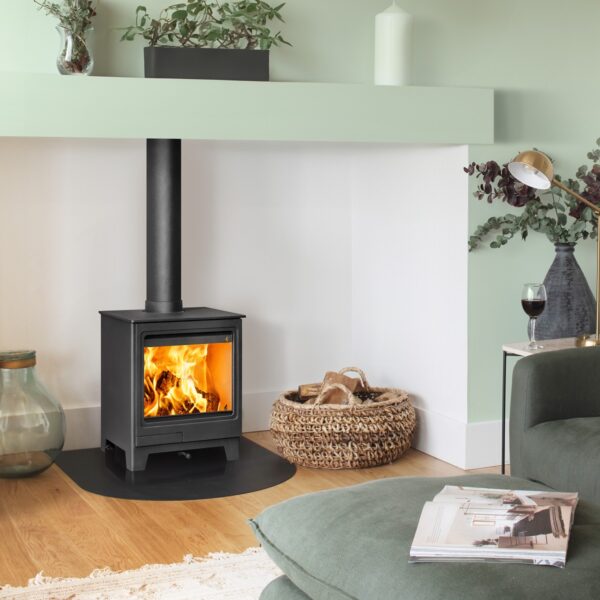 Hunter Allure 4 Wood-Burning Stove - Lifestyle Image with Slate Hearth in Fireplace and Sage Green Room