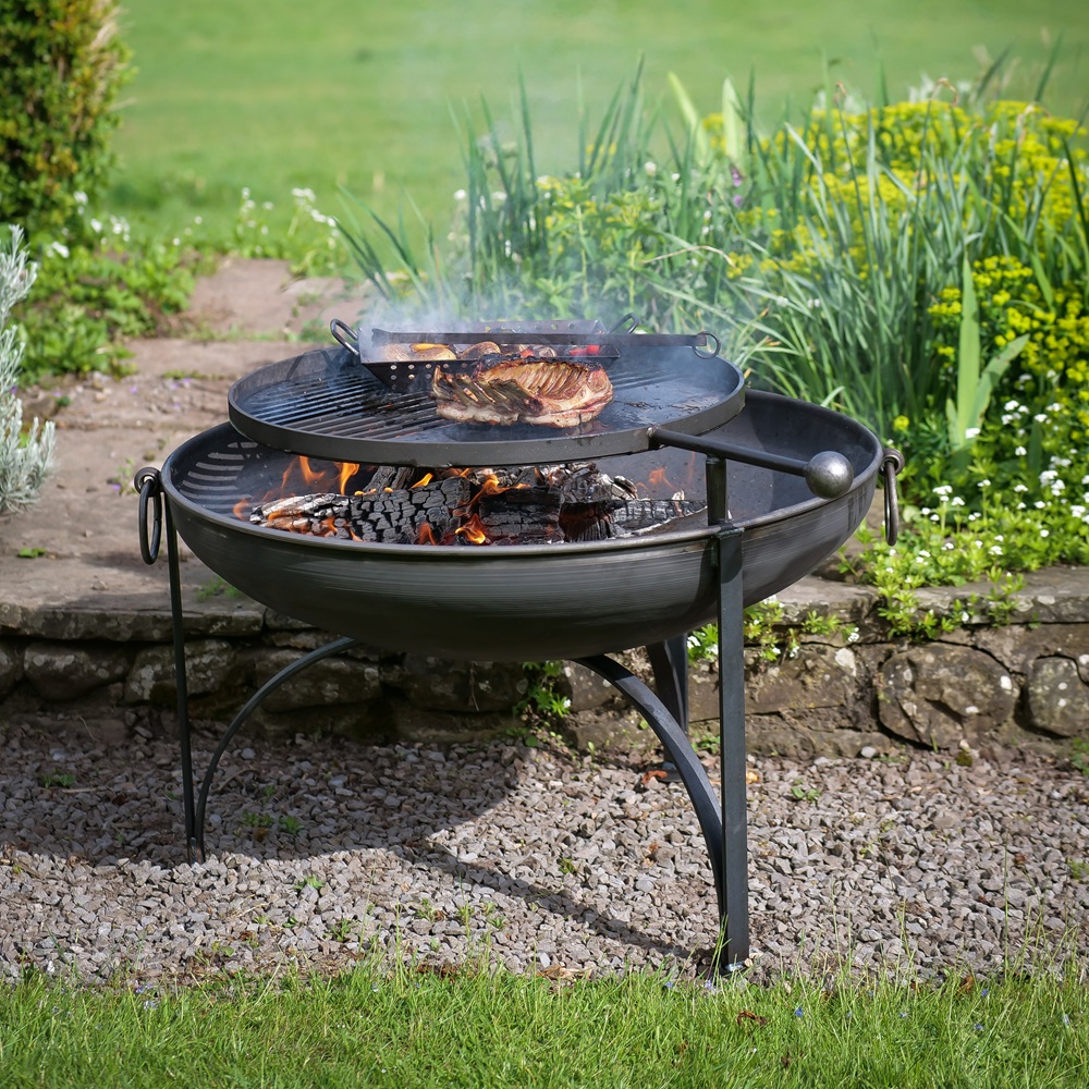 Plain Jane Fire Pit with Swing Arm - 50cm, 60cm and 70cm Variations. Lifestyle Image in a Garden Setting