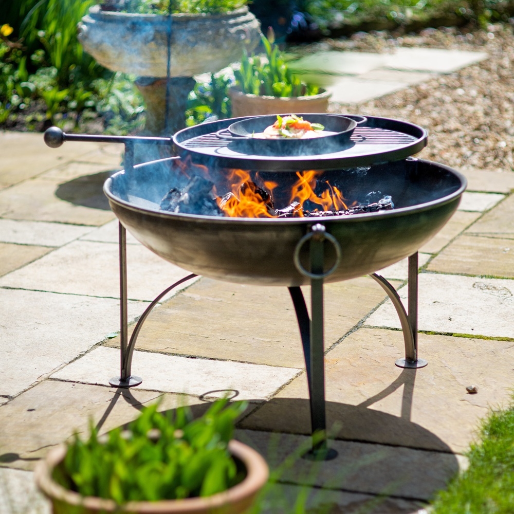 Plain Jane Fire Pit with Swing Arm - 50cm, 60cm and 70cm Variations. Lifestyle Image in a Patio Setting