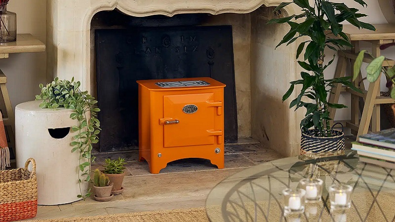 Everhot Electric Stove in Tangerine - Lifestyle Image - Electric heater with a 20 litre oven in Devon and the South West.