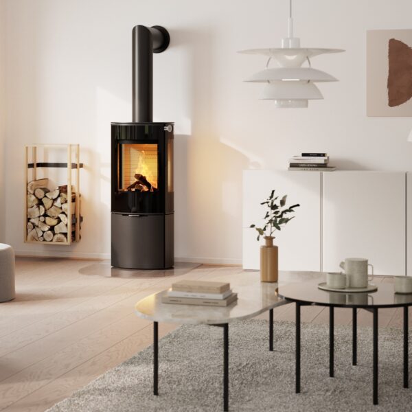 RAIS Caro 110 Wood-Burning Stove in Black - Lifestyle Image with Glass Door and Black Leather Handle