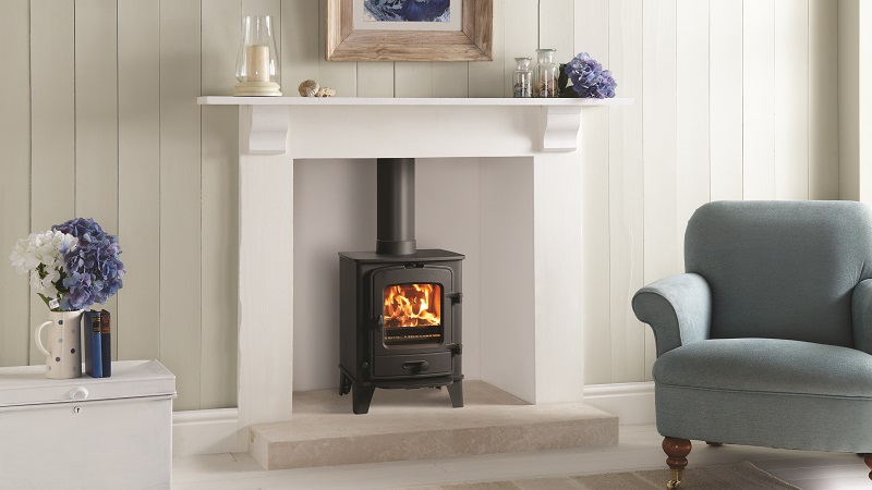 Stovax County 3 Multifuel Stove - Lifestyle Image in a Clean, White Fireplace Setting