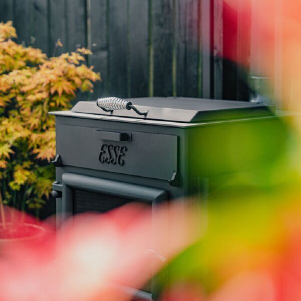 Esse Garden Stove with Pizza Oven - Lifestyle Image - Wood-Burning Outdoor Stove with Built-In Pizza Oven