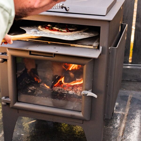 Esse Garden Stove with Pizza Oven - Pizza Peel Image - Wood-Burning Outdoor Stove with Built-In Pizza Oven
