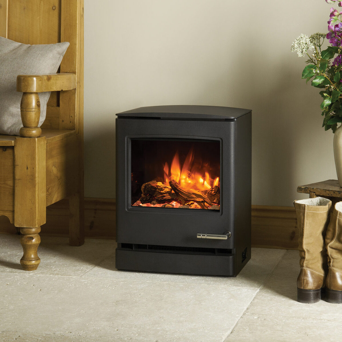 CL5 Electric Stove_1 Gazco Yeoman CL5 Electric Stove - Lifestyle image showing the stove freestanding in a living room setting.