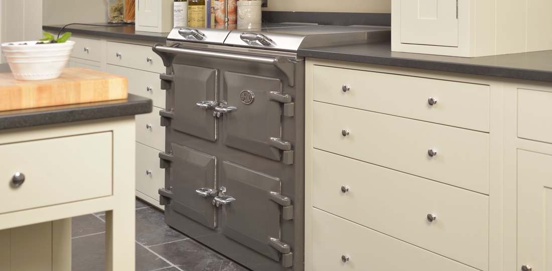 Everhot 110i in Graphite - Electric Range Cooker - Landscape lifestyle image in a crisp white kitchen setting.