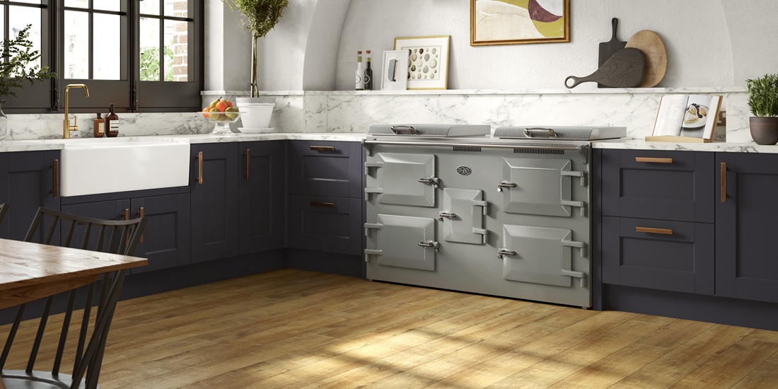 Everhot 150i Electric Range Cooker in Goose Grey - Landscape lifestyle image in a dark, navy kitchen setting.