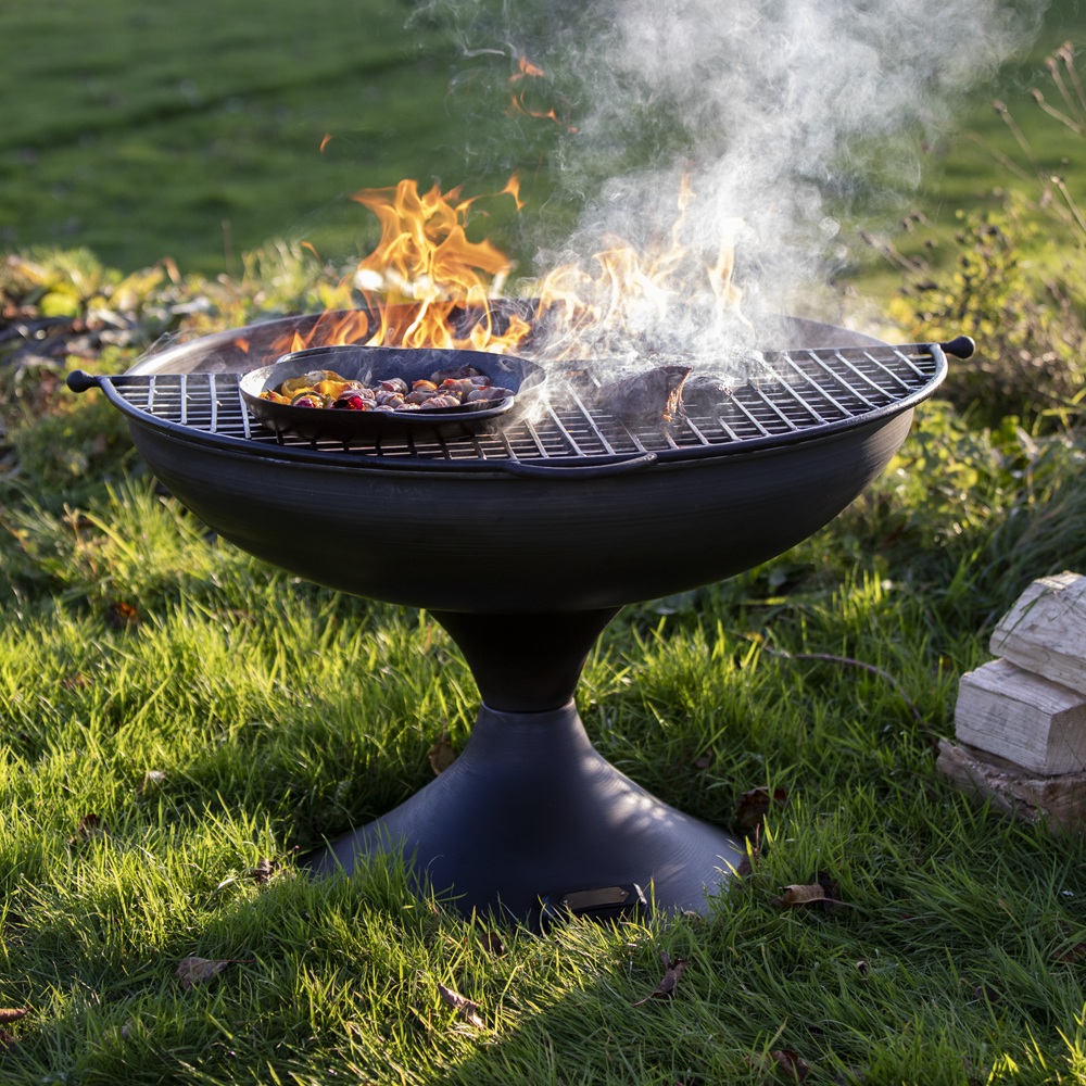 Wine Glass Fire Pit 70cm with Half Moon BBQ Grill Rack Plate & Bar - Lifestyle Image in Garden Space