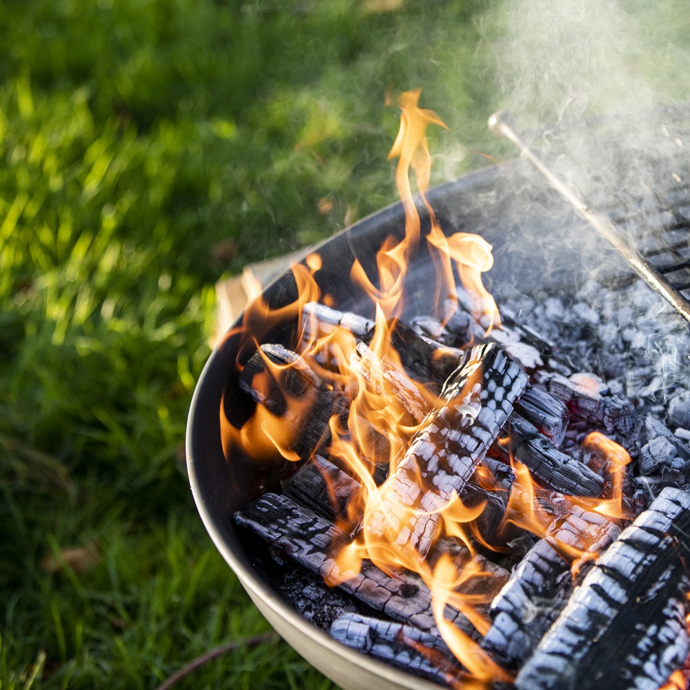Wine Glass Fire Pit 70cm with Half Moon BBQ Grill Rack Plate & Bar - Lifestyle Image Fire Detail